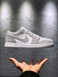 Nike Jordan 1 Low en color Wolf Grey